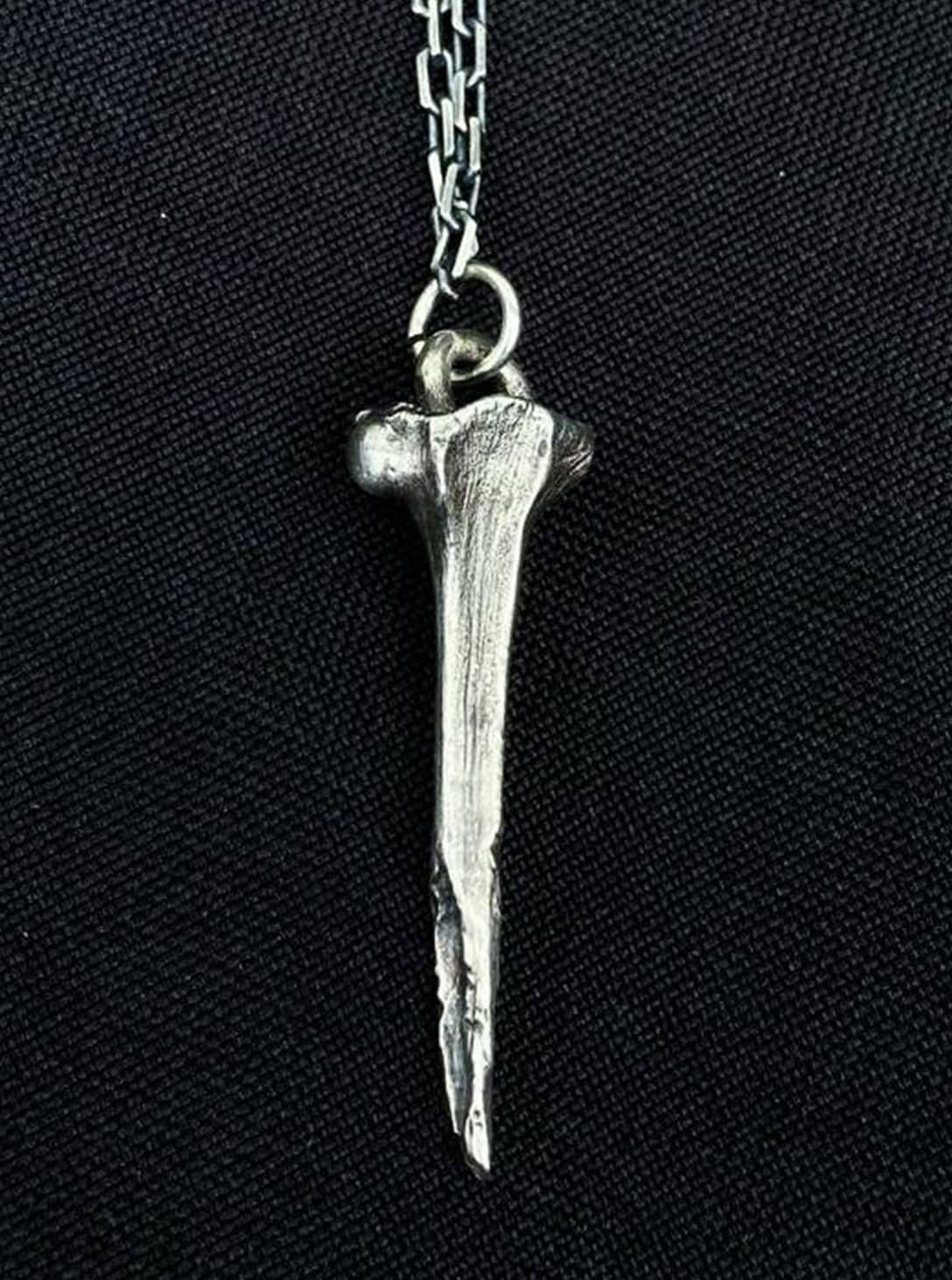 2(467) BROKEN BONE PENDANT - Image 1